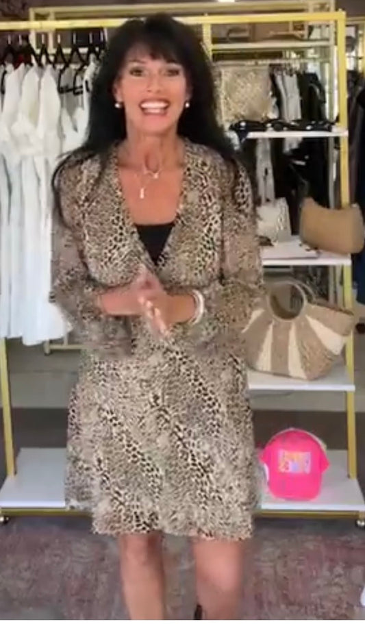 Laying In Leopard Dress