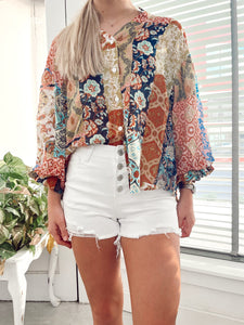 White Mid Rise Button Fly Shorts